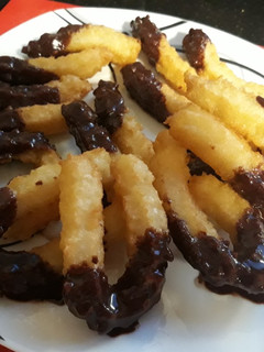 Una foto de Churros al chocolate