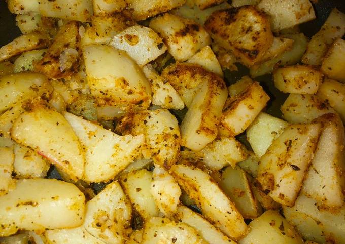 Cast iron onion garlic fried potatoes