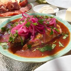 A picture of Canned Sardines in Tomato Sauce with Quick Pickled Red Onions.
