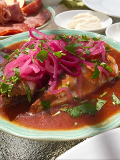 A picture of Canned Sardines in Tomato Sauce with Quick Pickled Red Onions.