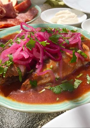 A picture of Canned Sardines in Tomato Sauce with Quick Pickled Red Onions.