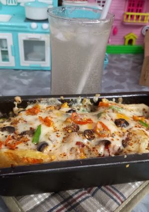 A picture of Pizza fries 🍟 😋.