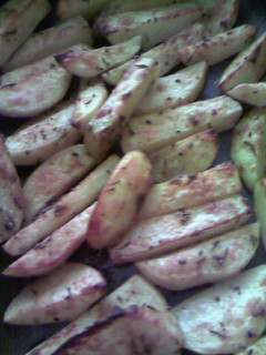 Una foto de Patatas especiadas fritas al horno