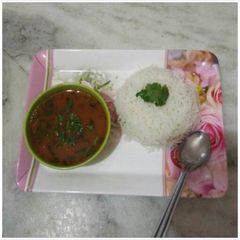 A picture of Rasam chawal (tomato).