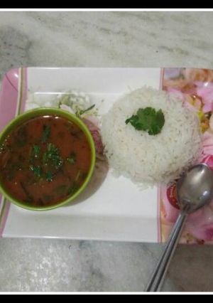 A picture of Rasam chawal (tomato).
