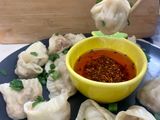Dumplings served with chilli oil and soya sauce dipping