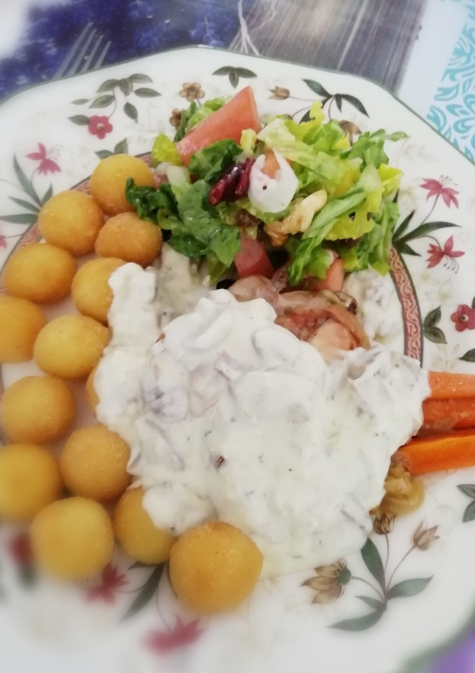 Una foto de Pollo al horno con salsa de champiñones