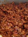 Chicharrón Prensado in Guajillo Chile Sauce