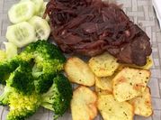 Una foto de chuletas al vino tinto