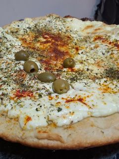 Una foto de A la masa con los niños de la casa, pizza casera para hacer en familia