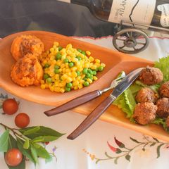 A picture of Cheesy meatballs with mashed sweet  potato and mixed veggies.