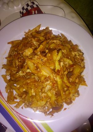 A picture of Potato chips dipped in egg and fish sauce.