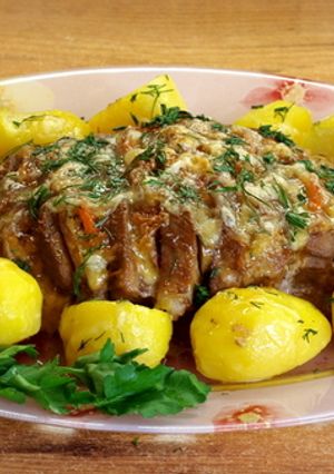 Фото Праздничное мясо "Гармошка" с гарниром.