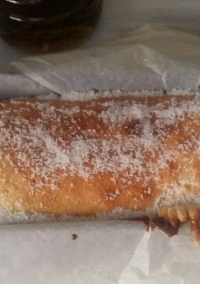 Una foto de Bizcocho de coco esponjoso