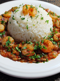 Una foto de Enchilada de Camarones con Arroz blanco