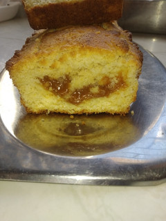 Una foto de Budín de coco y dulce de leche