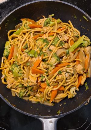 A picture of Satay chicken with Hokkien noodles.