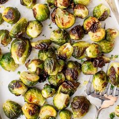 A picture of Roasted Brussels Sprout with Corn Cashews and cranberries.