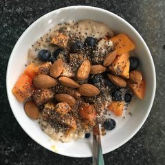 A picture of Gluten free, dairy free, rolled oats with fruit.