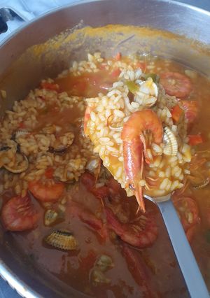 Una foto de Arroz caldoso de gamba roja y berberechos
