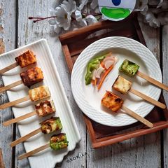 A picture of Tri colour paneer tikka popsticks.