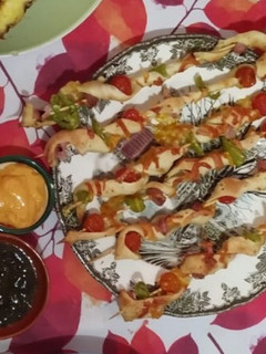 Una foto de Brochetas de pizza