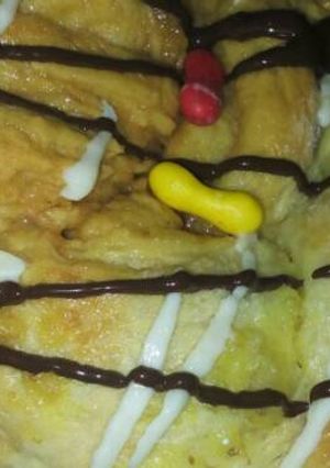 Una foto de Trenza rellena de manzana y crema pastelera
