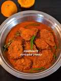Katla Komola (Katla fish cooked in orange gravy)