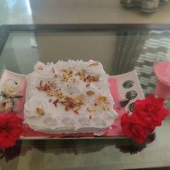 A picture of Rose milk cake.