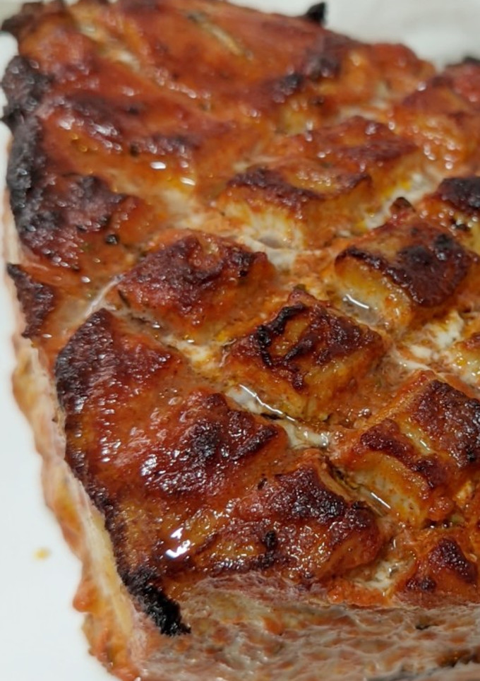 Una foto de Lomo de cerdo en salsa de naranja y pimentón dulce
