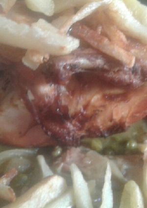 Une photo de Poulet et Haricot
