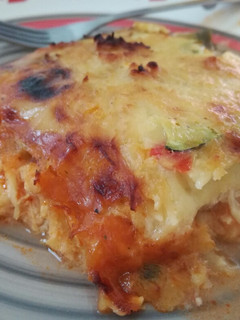 Una foto de Lasaña de zapallo italiano con pollo bechamel