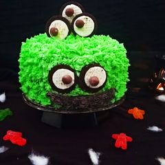 A picture of Monster Oreo Cake with Oreo Buttercream Frosting.