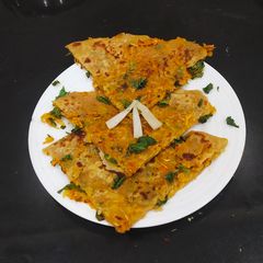 A picture of Radish Paratha With Greens.