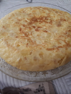 Una foto de Tortilla de patatas con cebollita