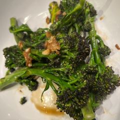 Purple sprouting broccoli with garlic, ginger and soy sauce A picture of Purple sprouting broccoli with garlic, ginger and soy sauce.