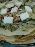 Torre de crepes con acelga gratinada