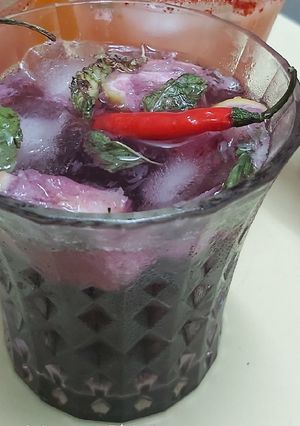 A picture of Thai red chilli Kala khatta mojitto.