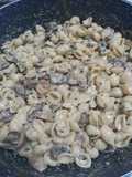 Pasta de caracol con champiñones, crema y chipotle