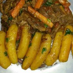 A picture of Matoke and beef stew.