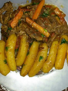 A picture of Matoke and beef stew.
