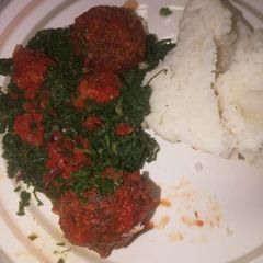 Ugali served with Meatballs and sukuma wiki A picture of Ugali served with Meatballs and sukuma wiki.