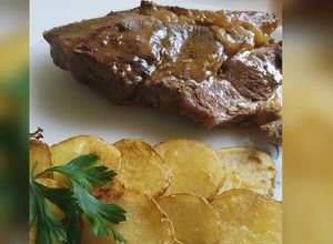 Una foto de Marucha al horno con papas