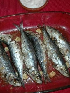 Una foto de Sardinas al horno con alioli