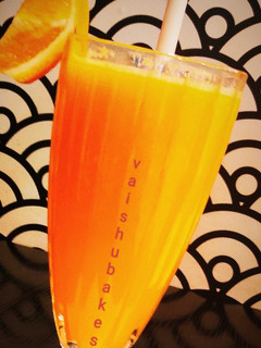 A picture of Orange Coco Sunset Mocktail.