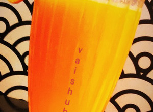 A picture of Orange Coco Sunset Mocktail.
