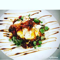 A picture of Lemony Salt and Black Pepper Cod on a Gratin Dauphinois Potatoes.
