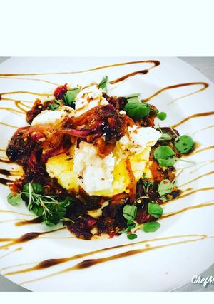 A picture of Lemony Salt and Black Pepper Cod on a Gratin Dauphinois Potatoes.