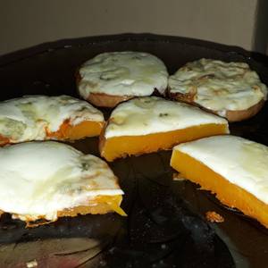 Rodajas de zapallo con queso al horno