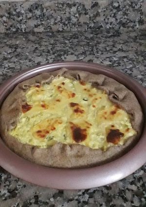 Una foto de Tarta de cebollas y ricota🍽